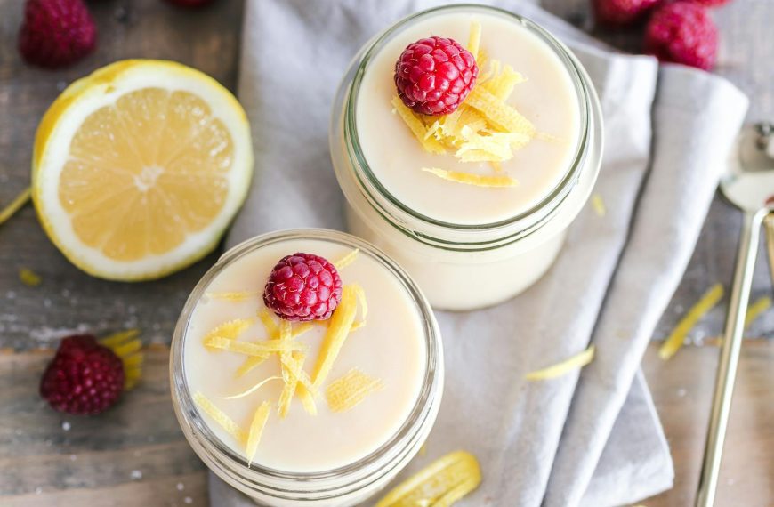 Fresh lemon raspberry yogurt in mason jars, perfect for a refreshing dessert.