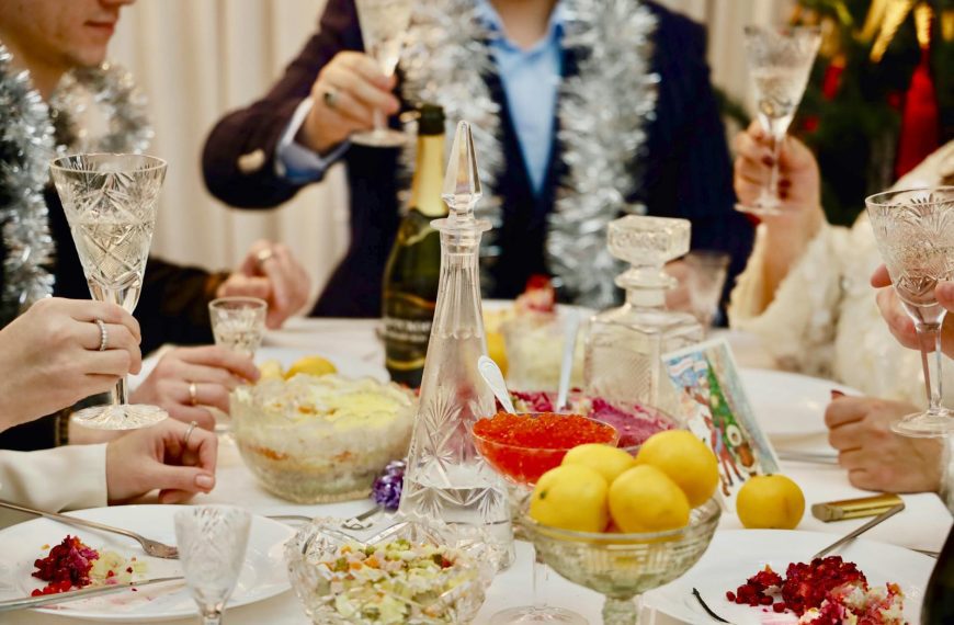 Elegant celebration with champagne toasts and festive dishes, perfect for a holiday gathering.