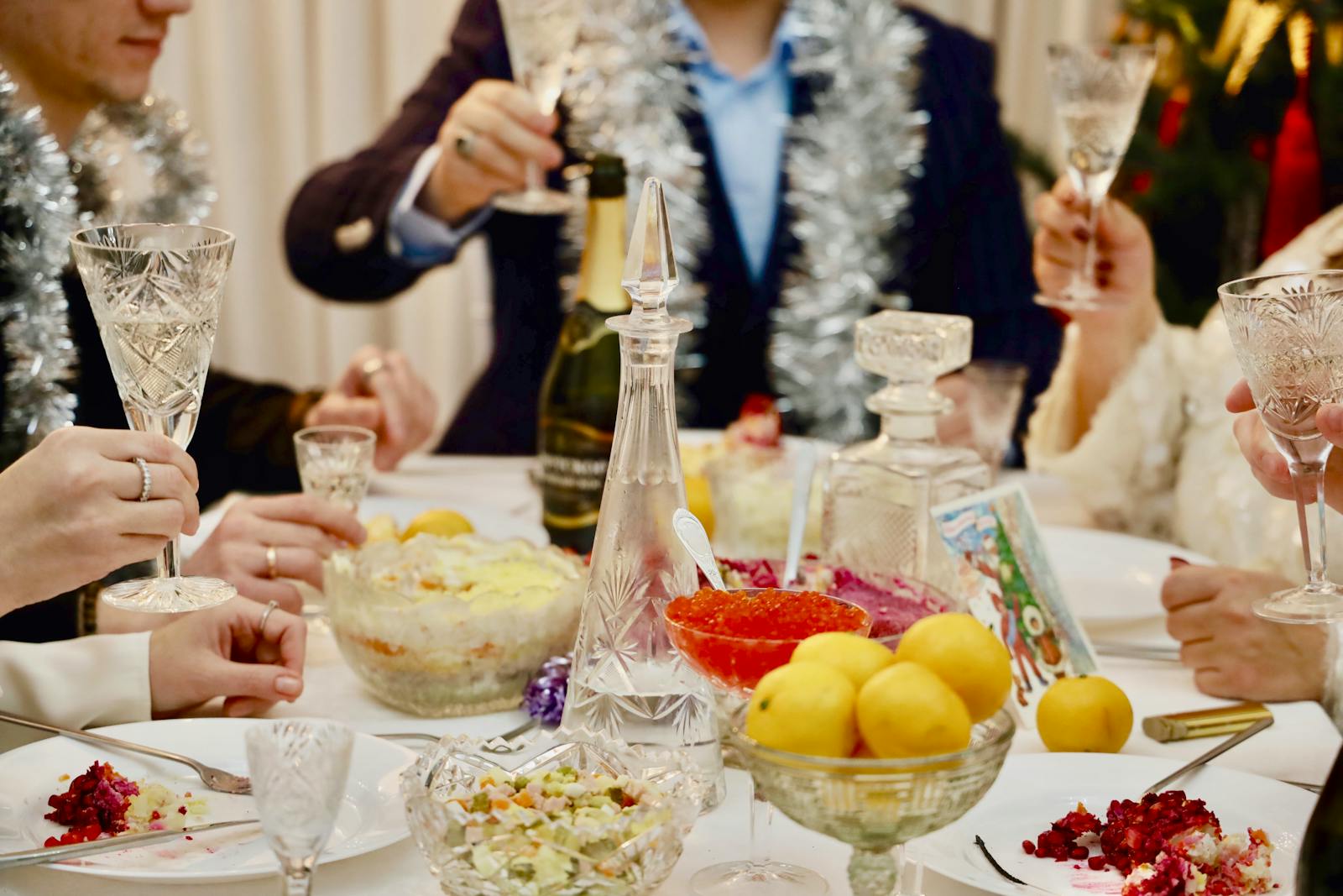 Elegant celebration with champagne toasts and festive dishes, perfect for a holiday gathering.