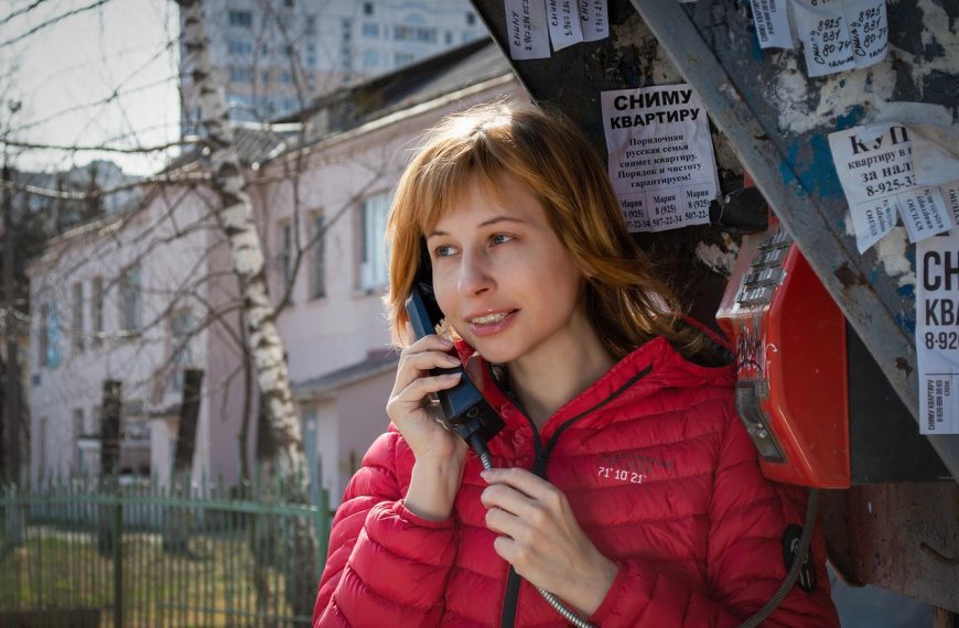 woman, call, phone booth, payphone, landline telephone, street, city, road, winter, communication