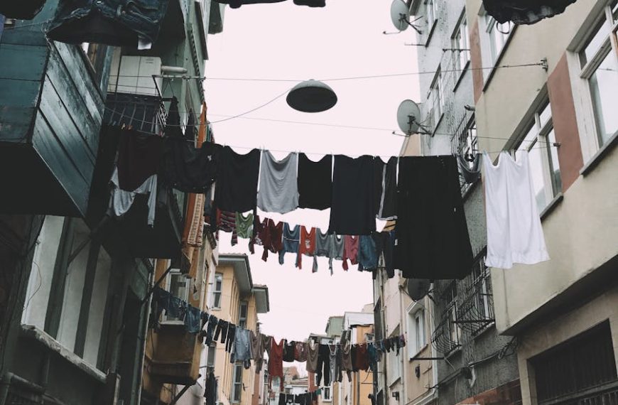 Street scene in Fatih, Istanbul with clotheslines and local life captured. Vibrant and authentic.