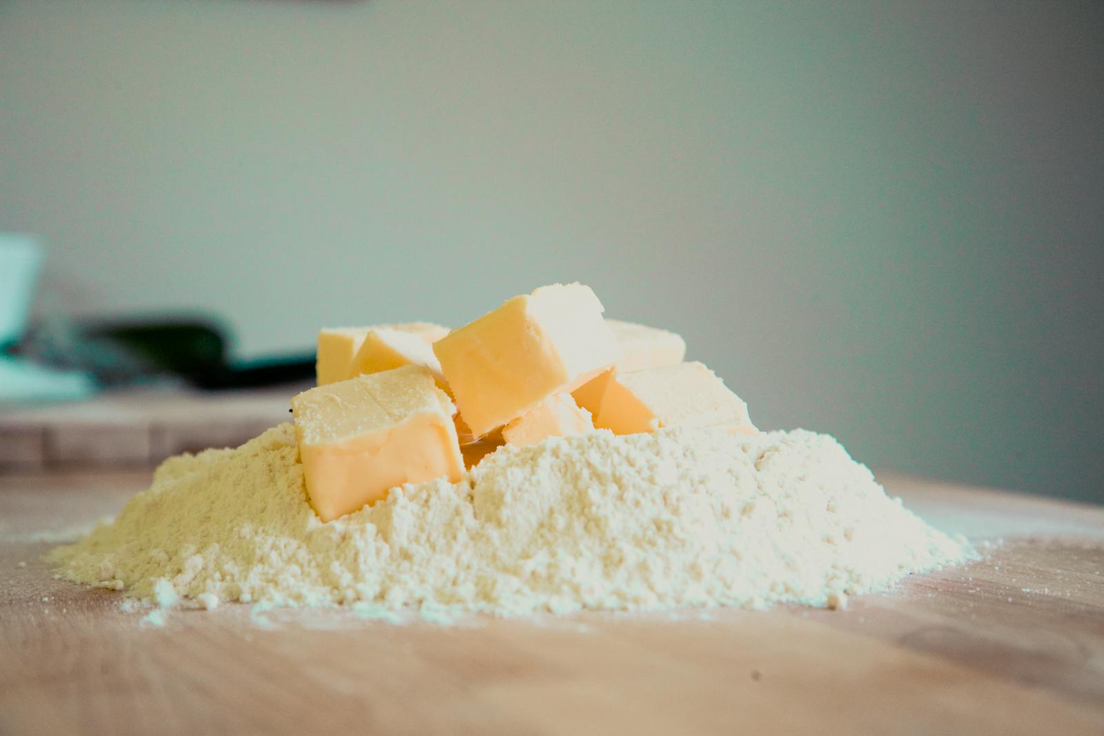 Close-up of butter and flour on a kitchen counter, perfect for baking.