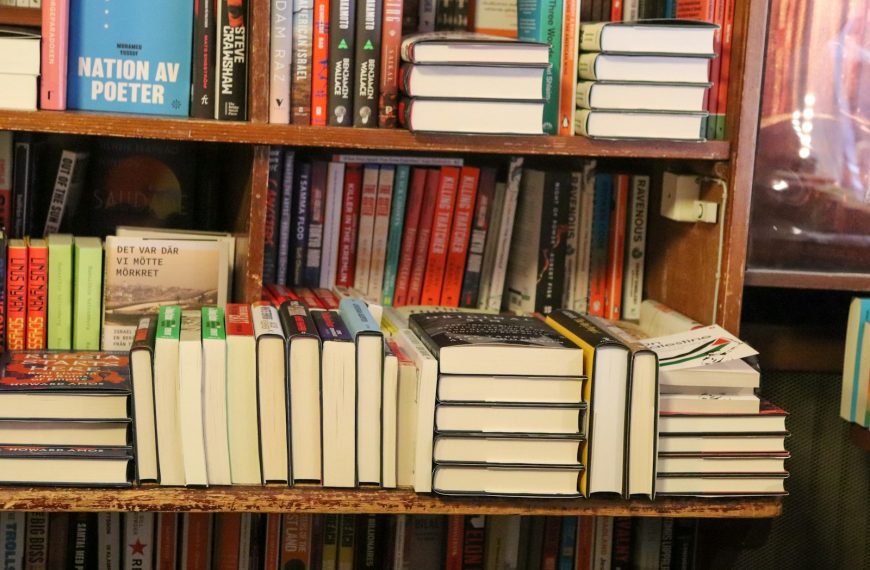 Bookshelves are packed with many, many books.