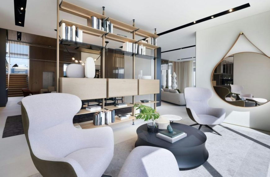 Modern living room with stylish furniture and shelving.