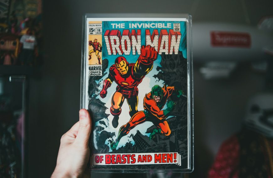 a person holding a comic book in their hand