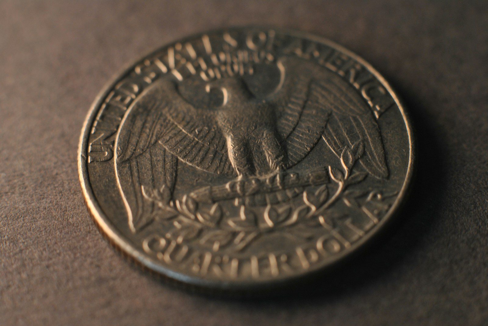 A close up of a coin on a table