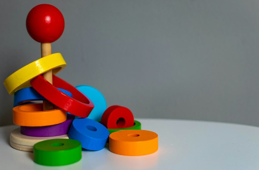 blue green yellow and red plastic toy