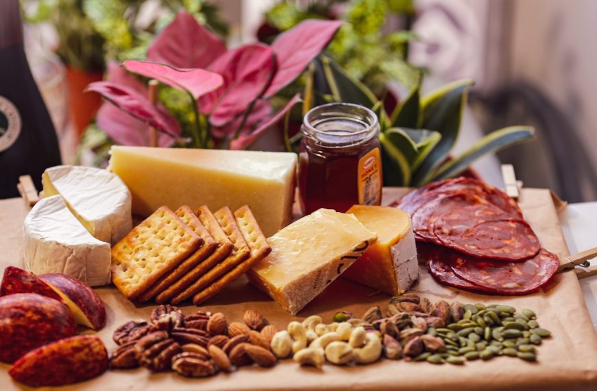 brown and white biscuits on green leaves