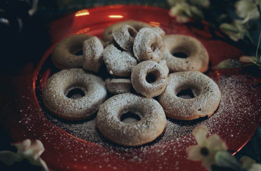 brown donuts on red ceramic plate