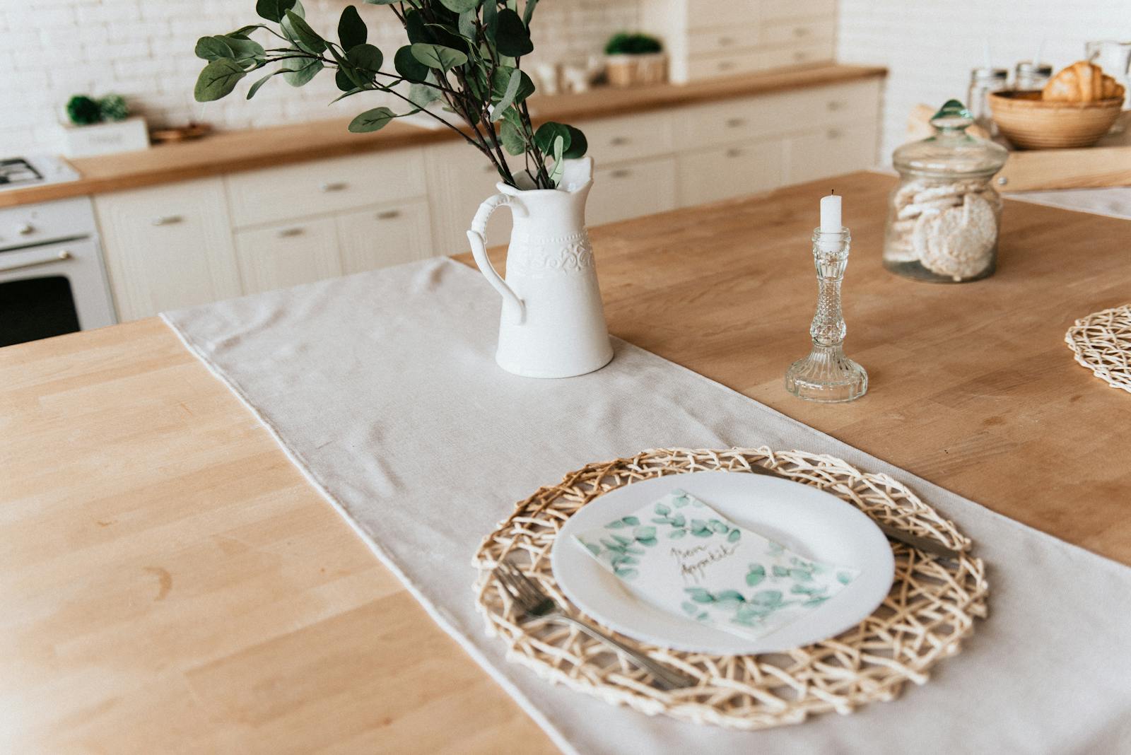 A stylish dining table with floral decor, perfect for a cozy indoor atmosphere in a home kitchen.