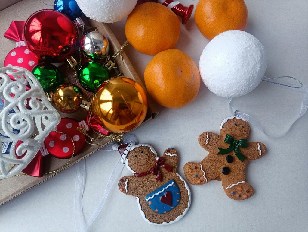 A collection of colorful Christmas ornaments and gingerbread decorations for a festive holiday atmosphere.