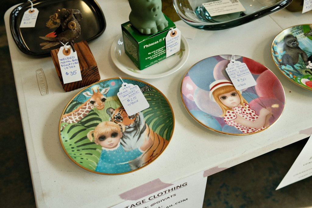 a table topped with plates covered in animals