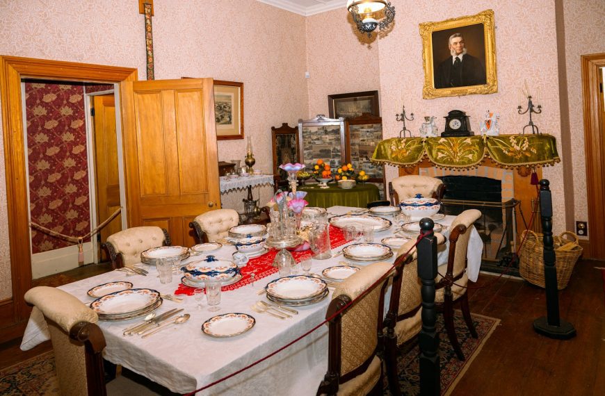 a dining room with a table and chairs