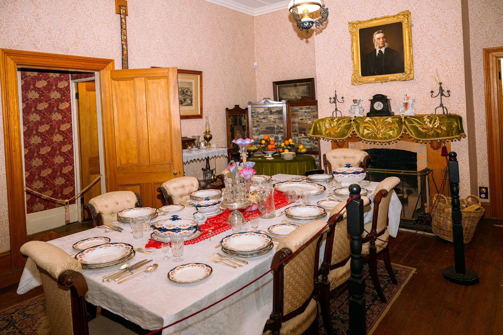 a dining room with a table and chairs