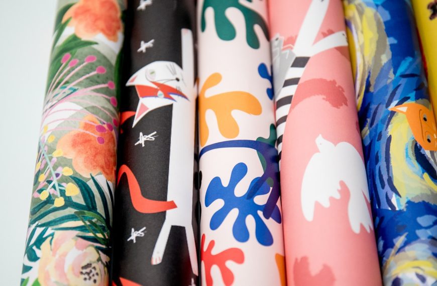 black white blue and pink floral textile