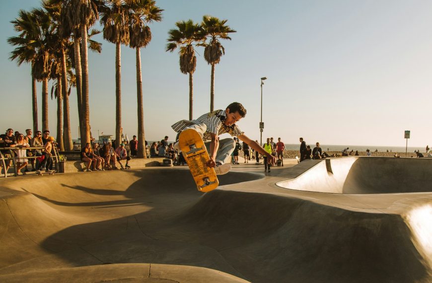 time-lapse photo of man riding skateboard at skate park
