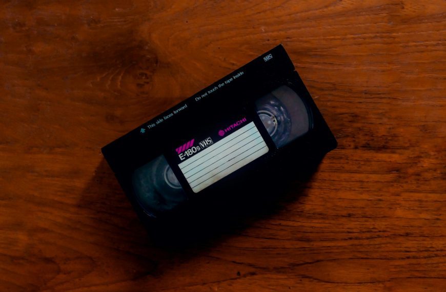 black plastic pack on brown wooden table
