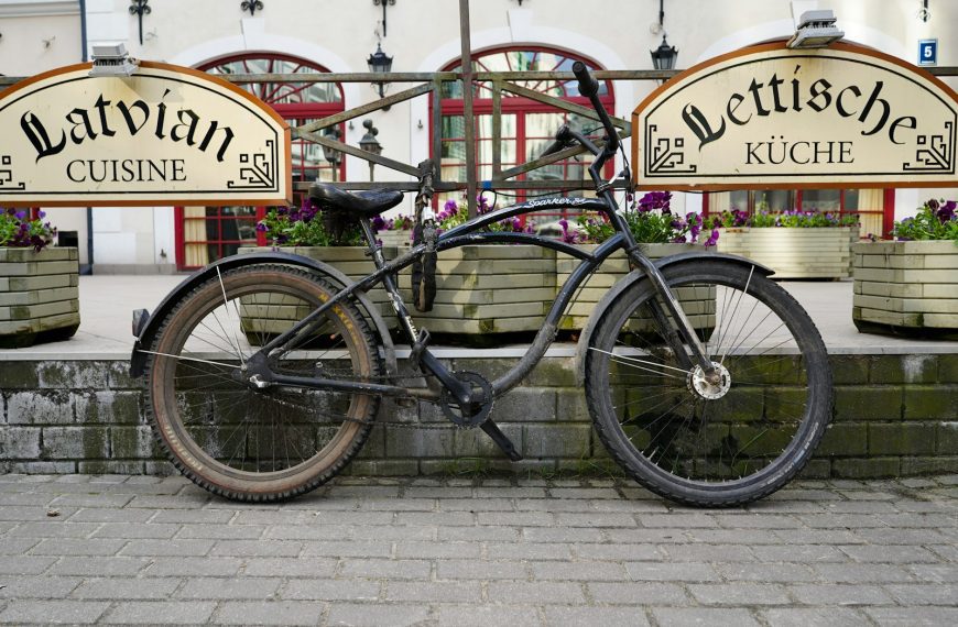 a bicycle parked in front of a restaurant