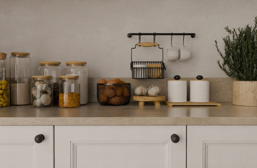 A kitchen counter topped with lots of jars and containers