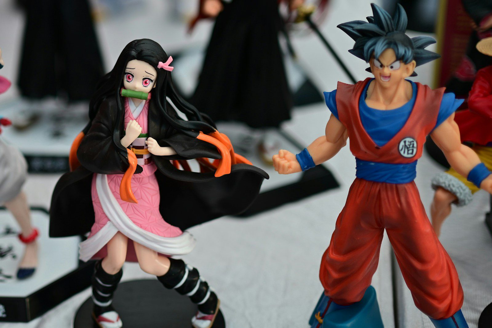 Anime action figures of nezuko and goku