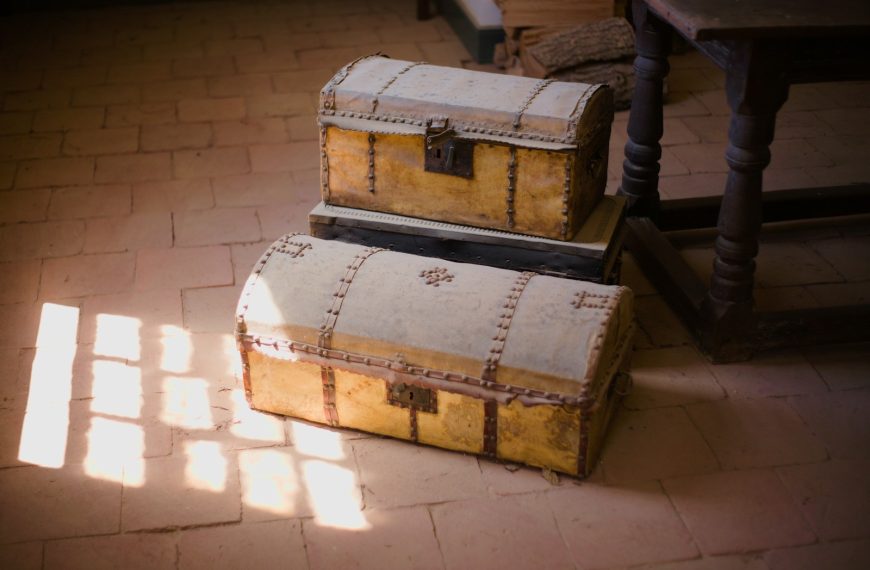 a couple of suitcases on a tile floor