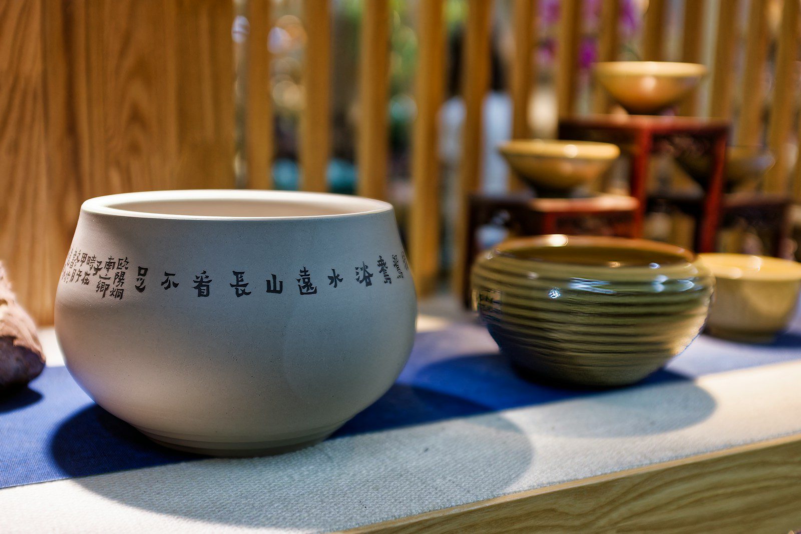 A table topped with bowls and plates on top of a table