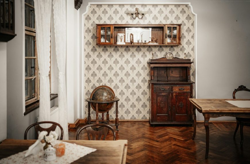 a dining room with a table and chairs