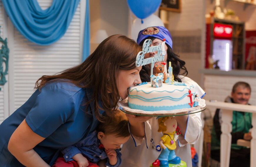 cake, mom with baby, son with mom, boy, mom, baby with mom, holiday, bites the cake, cake topper, a son, baby, happy birthday, in blue