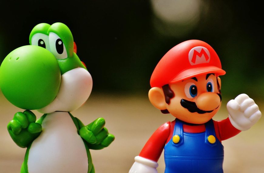 Detailed close-up of Mario and Yoshi figurines from a popular video game franchise.