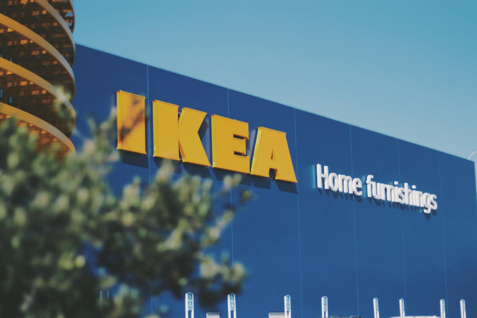Beautiful image of a blue IKEA storefront with visible home furnishings sign.
