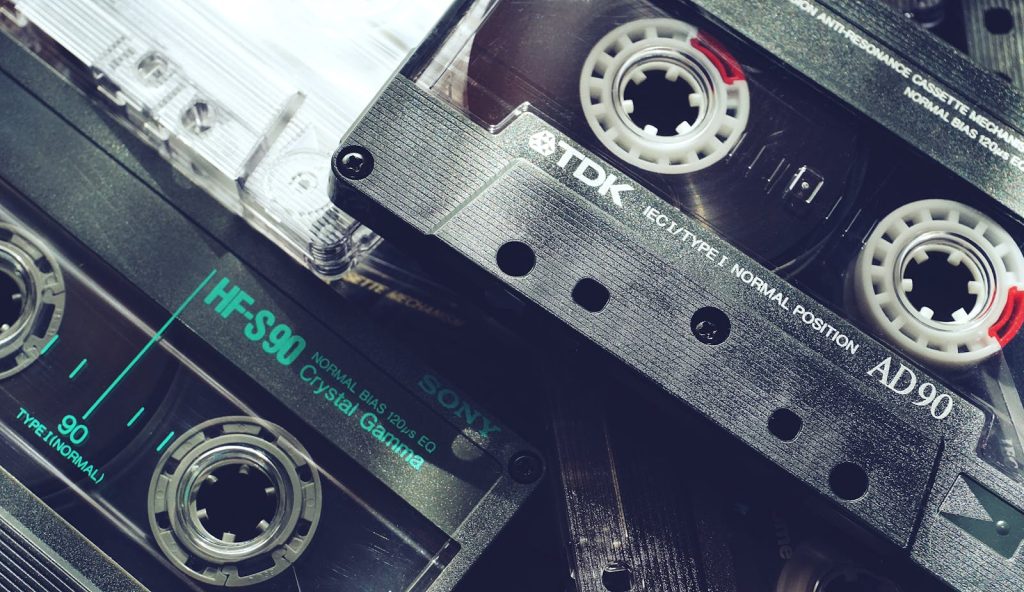 A nostalgic close-up of vintage cassette tapes showcasing 1980s audio technology and retro vibes.