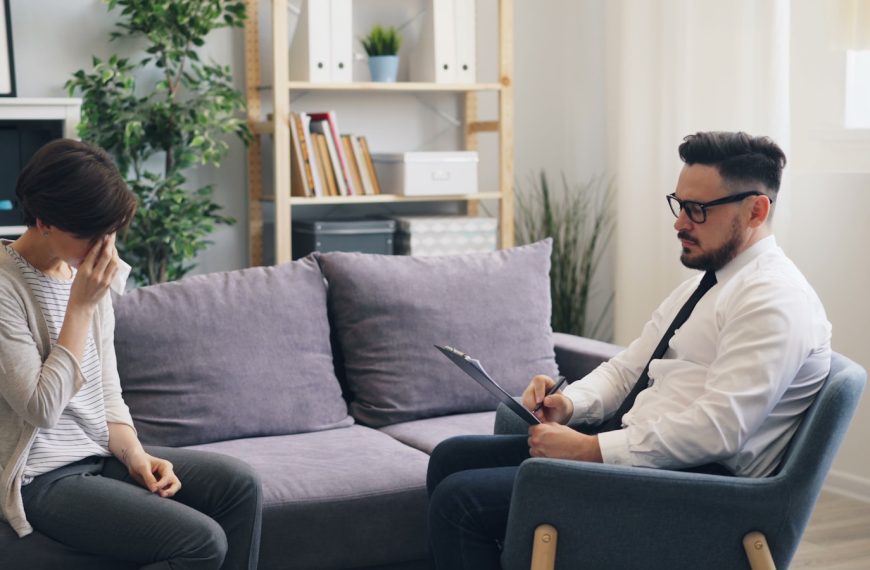 a man and a woman sitting on a couch