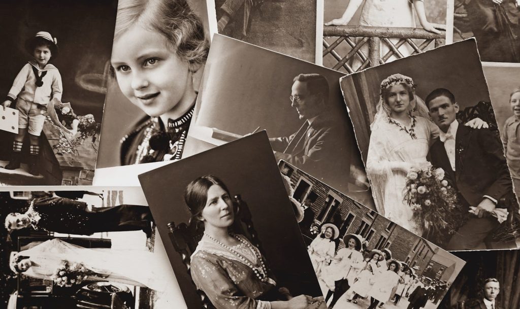 A nostalgic collection of vintage black and white family photographs, showcasing historical memories.