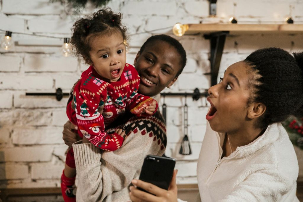 A family enjoying a video call together with festive cheer and happiness.