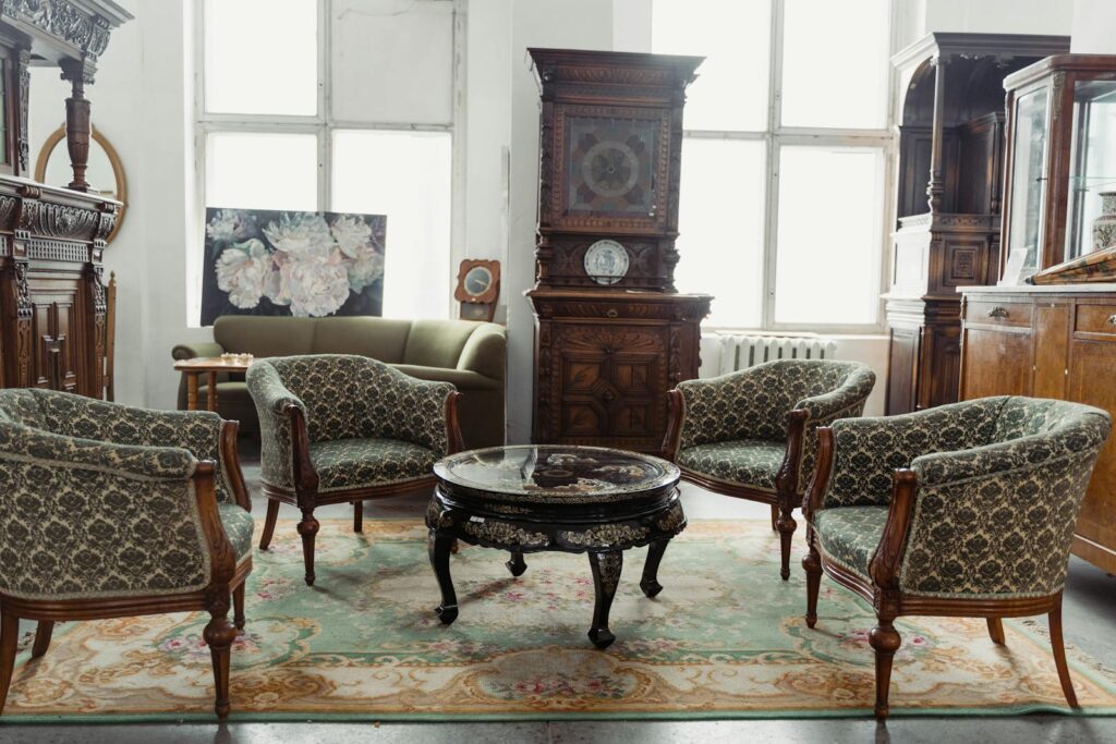 A charming vintage room featuring elegant antique furniture and decor.