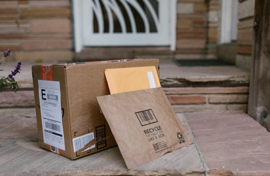 Close-up of delivered packages on doorstep, symbolizing online shopping and home delivery.
