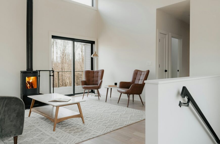 a living room filled with furniture and a fire place