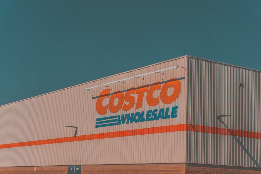a building with a sign that says costco whole sale