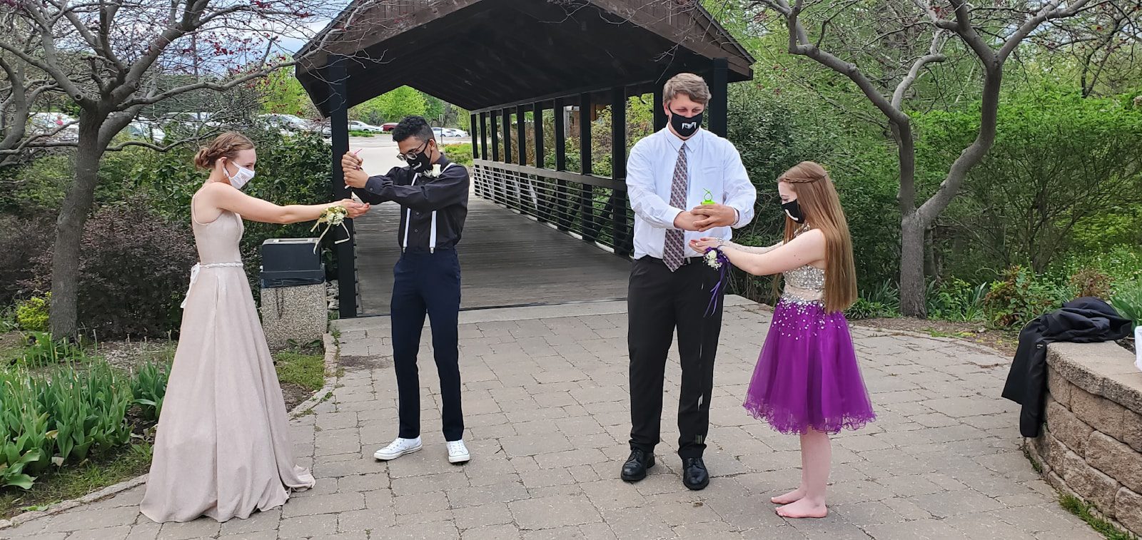 man in black suit jacket and woman in white dress shirt
