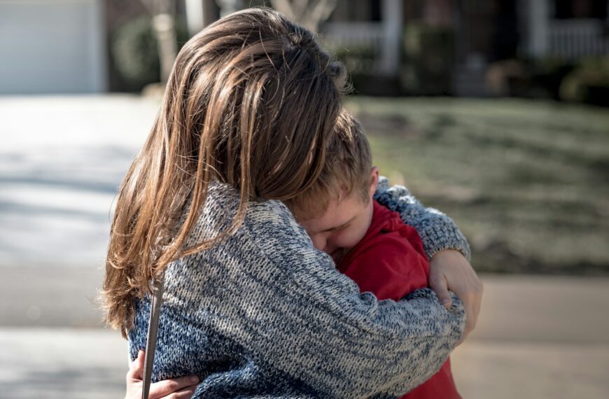 girl and boy hugging