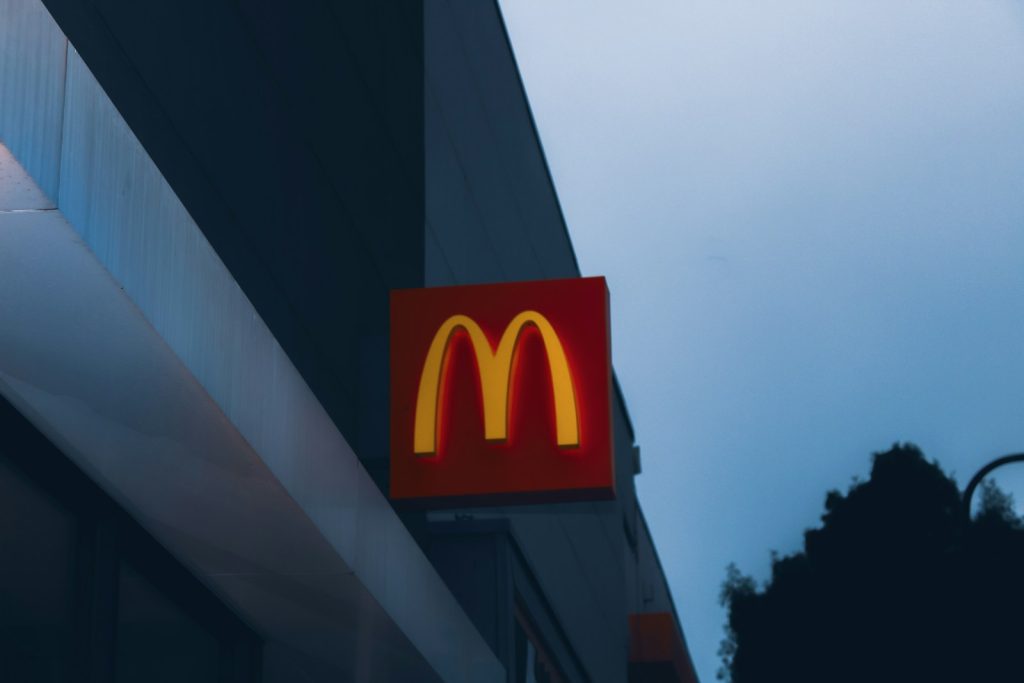 a close up of a mcdonald's sign on a building