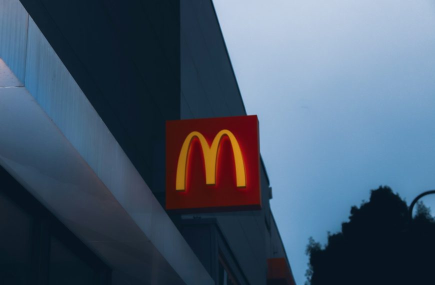 a close up of a mcdonald's sign on a building