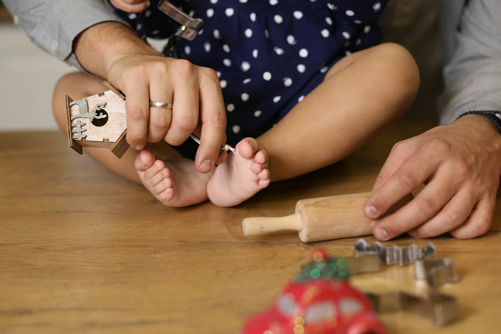 a man and a woman are playing with toys