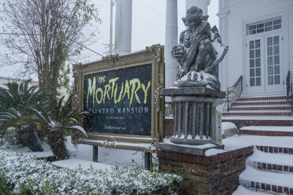 A sign that is in front of a building