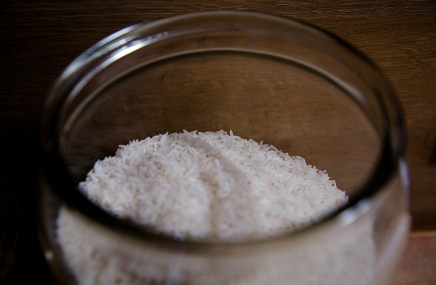 white powder in clear glass container
