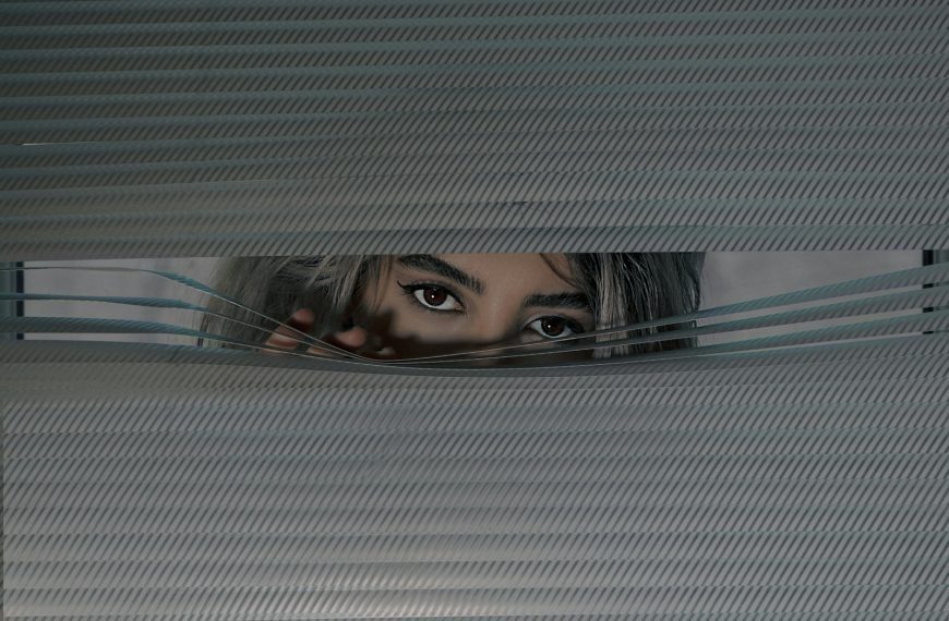 womans face on screen