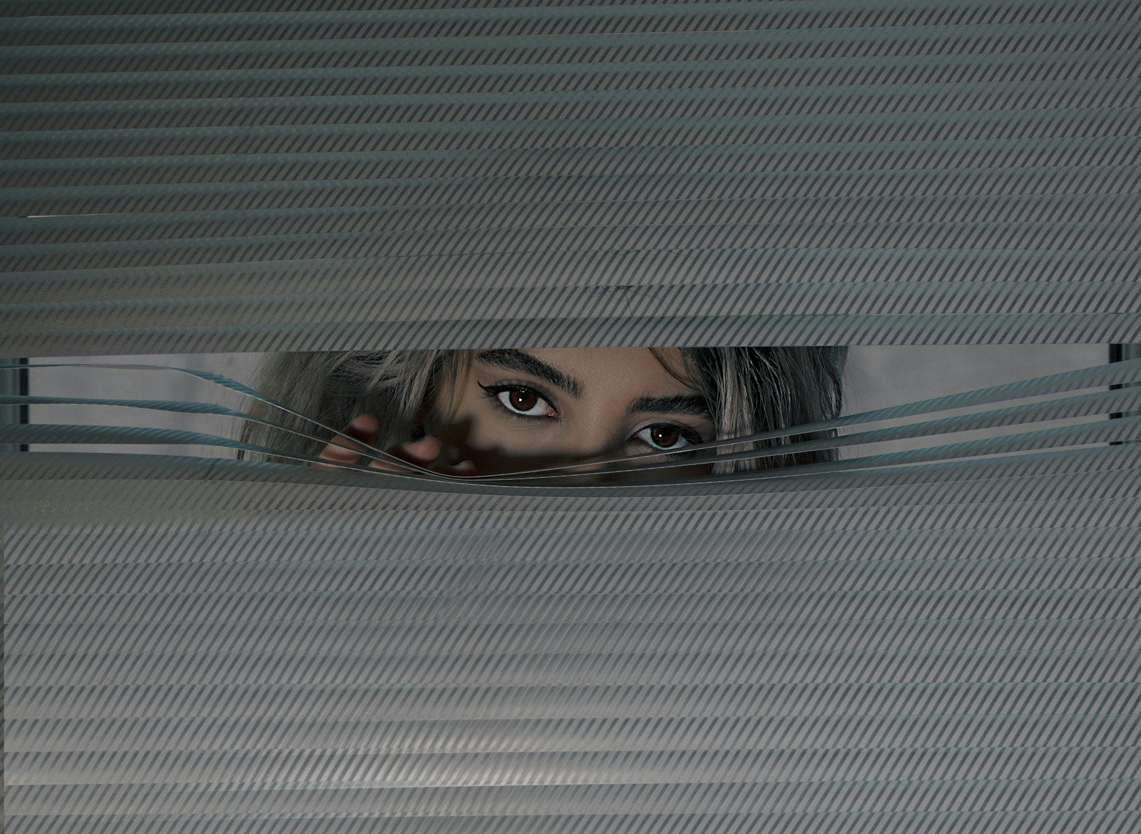 womans face on screen