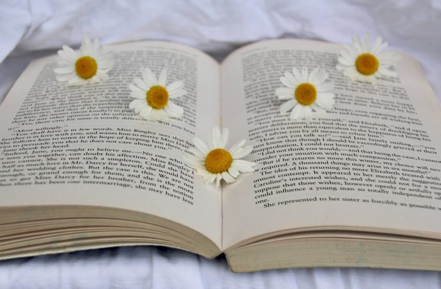white flower on book page