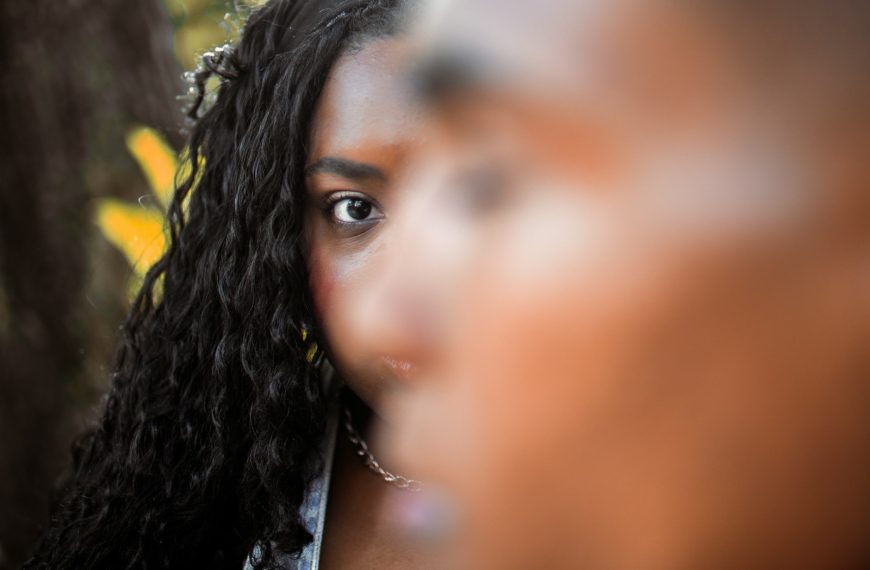 a close up of a person with long hair