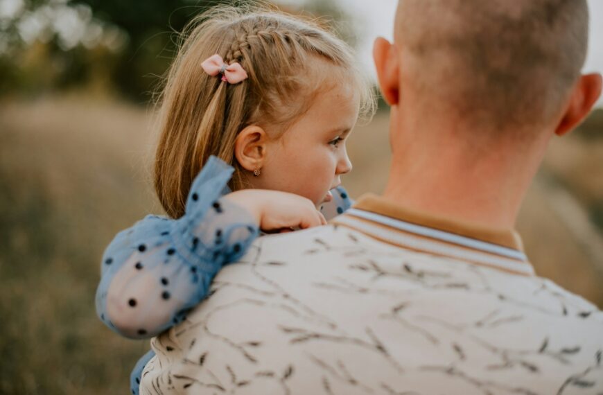 a person holding a baby